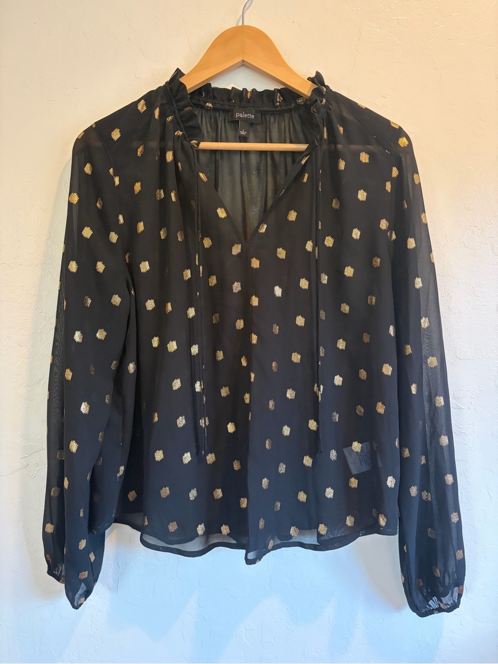 Ruffle-Neck Black Blouse with Gold Dot Accent